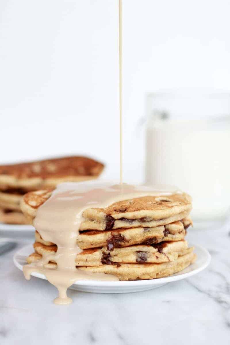 Whole Wheat Chocolate Chip Banana Bread Pancakes with a Vanilla Coconut Glaze