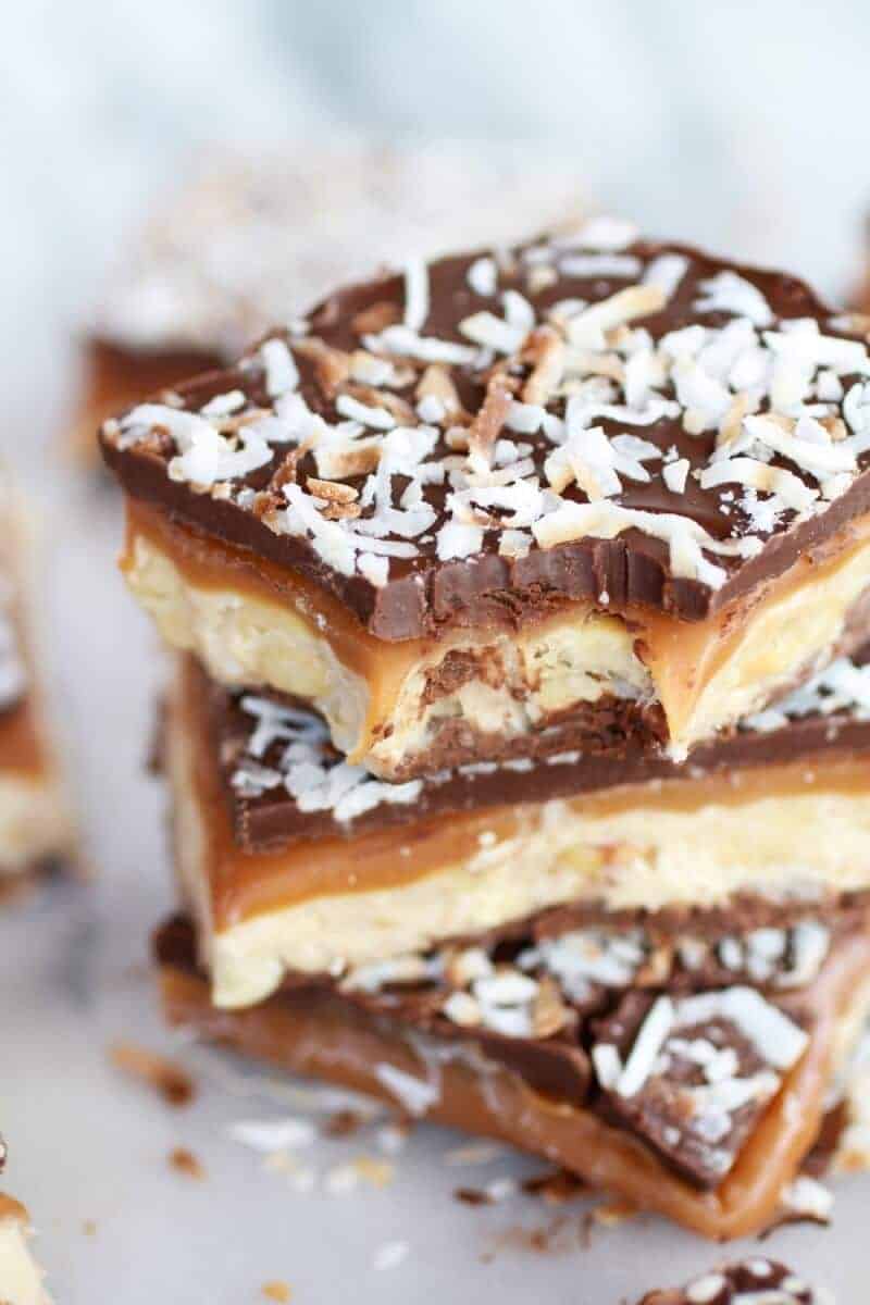 Toasted Coconut Caramel Peanut Butter Snickers Bars | halfbakedharvest.com