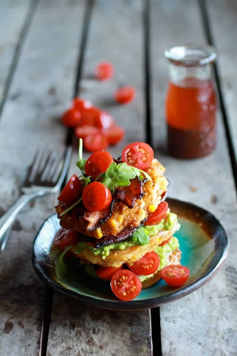 Avocado and Gouda BLT Corn Fritter Stacks with Chipotle Bourbon Dressing | halfbakedharvest.com
