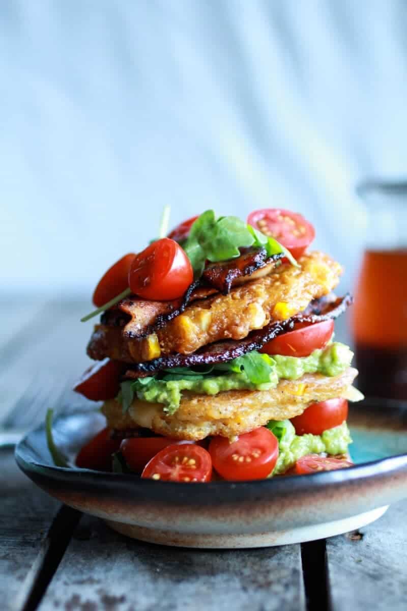 Avocado and Gouda BLT Corn Fritter Stacks with Chipotle Bourbon Dressing | halfbakedharvest.com