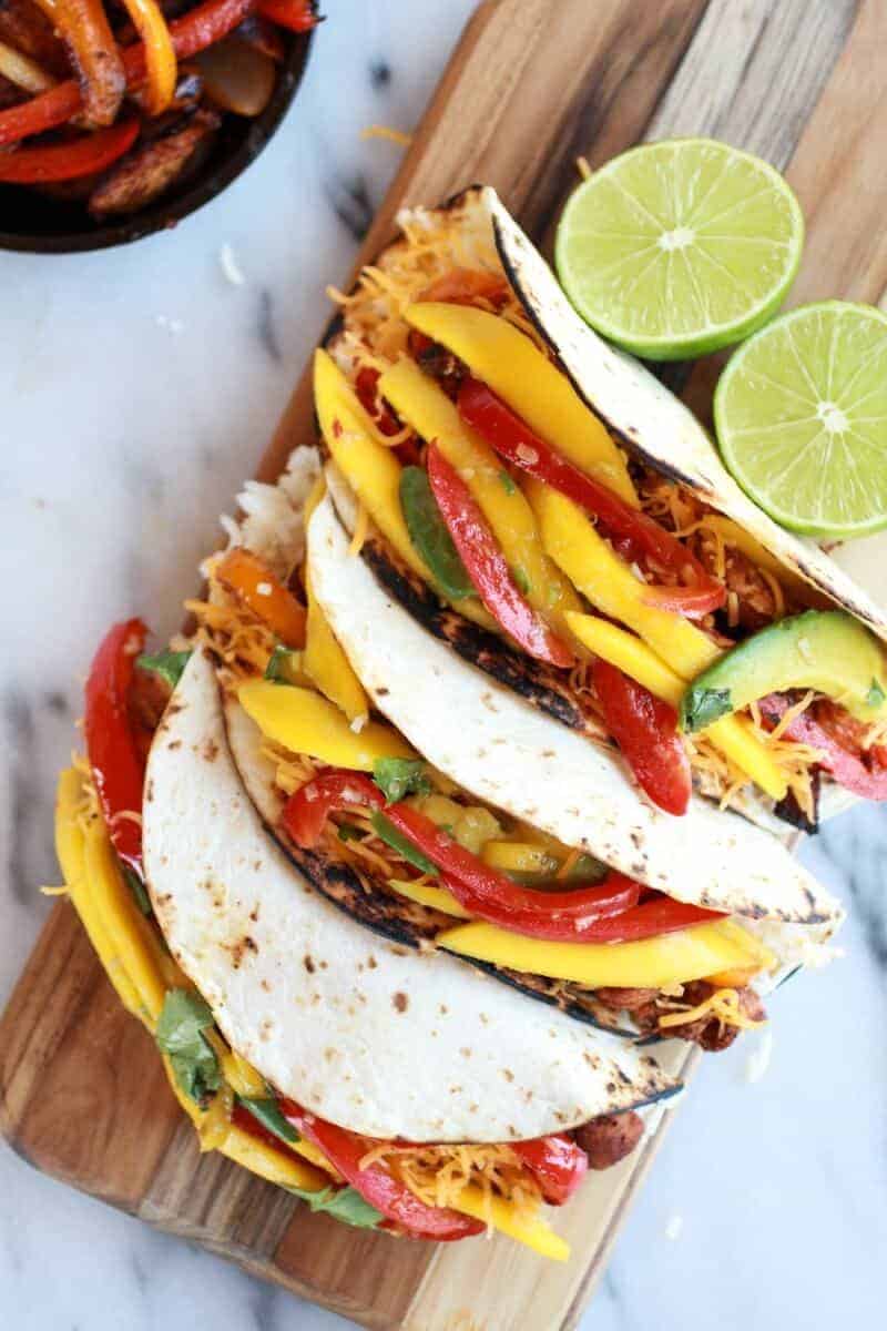 Easy Chicken Fajitas with Thai Mango Slaw and Coconut Rice | halfbakedharvest.com/