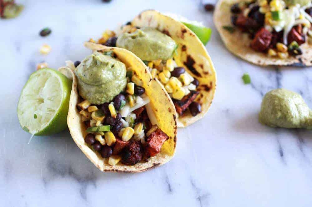 Sweet potato + Chorizo Tacos with Black Bean Salsa and Roasted Poblano Avocado Crema | halfbakedharvest.com