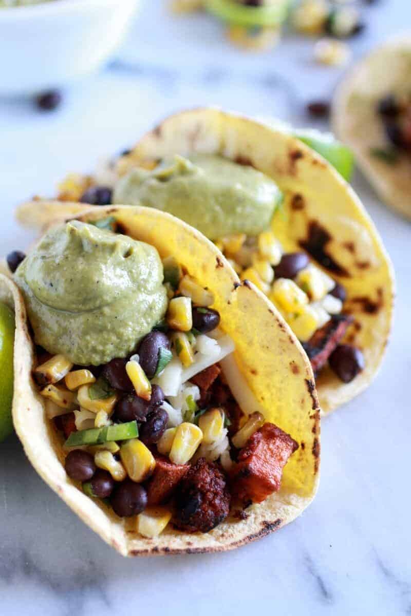 Sweet potato + Chorizo Tacos with Black Bean Salsa and Roasted Poblano Avocado Crema | halfbakedharvest.com