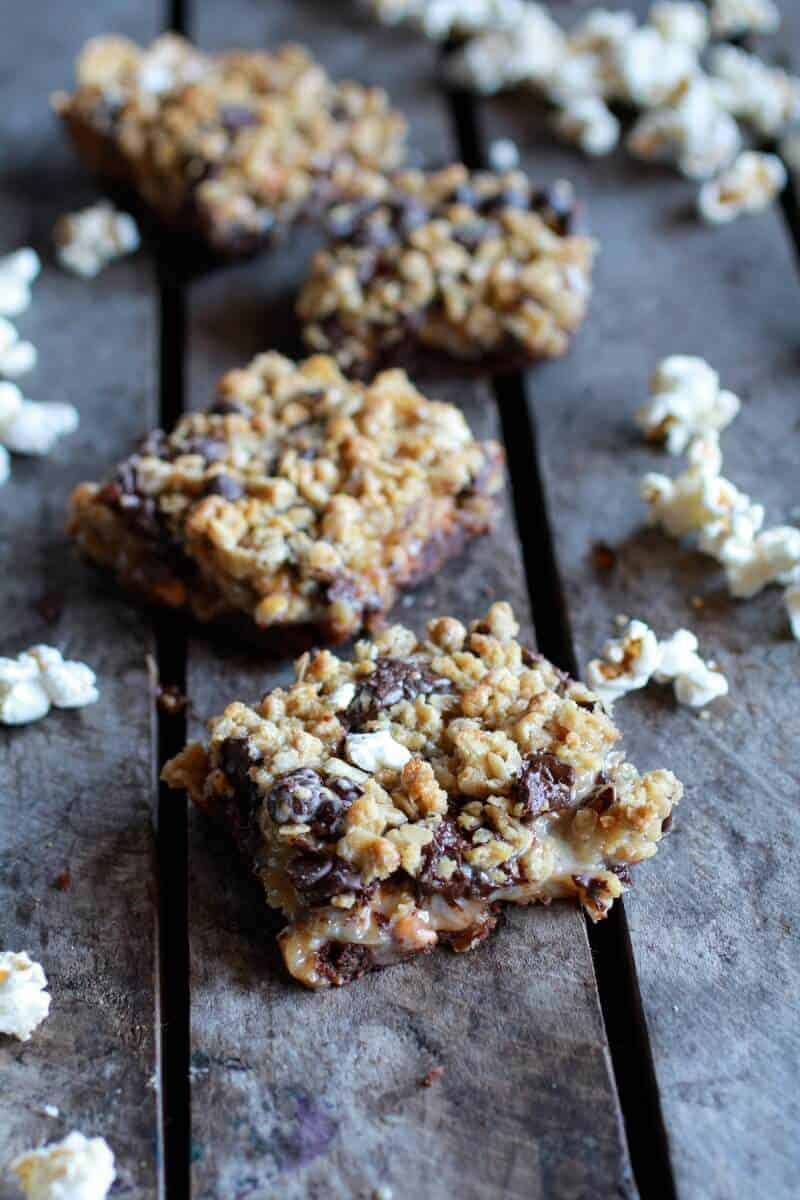 Fudge Brownie, Caramel, Popcorn + Oatmeal Cookie Crumble 7 Layer Bars | halfbakedharvest.com