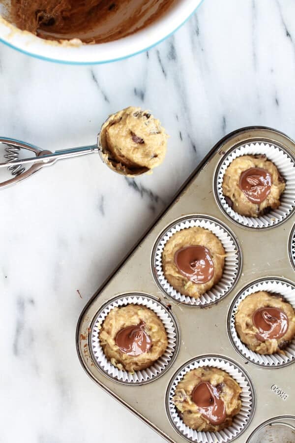 Nutella Stuffed Whole Wheat Peanut Butter Banana and Zucchini Muffins | halfbakedharvest.com