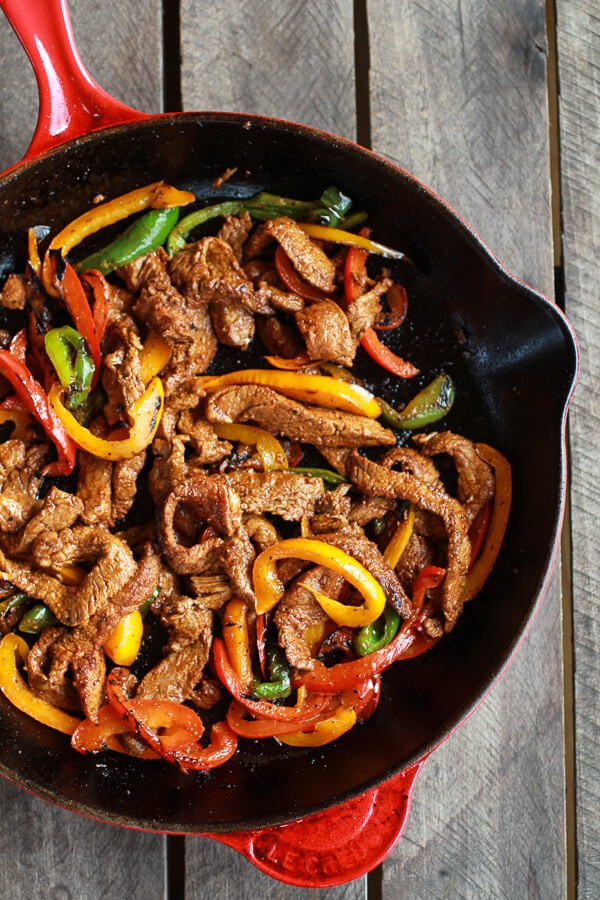 Steak Fajita Stuffed Baked Potatoes with Avocado Chipotle Crema | halfbakedharvest.com