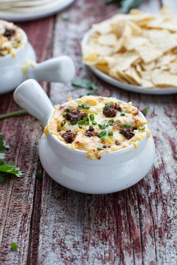 Cheesy Fontina Chorizo + Caramelized Onion and Artichoke Dip | halfbakedharvest.com