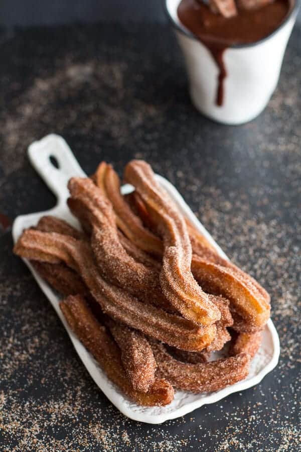 Mexican Beer Spiked Churros with Chocolate Dulce De Leche | halfbakedharvest.com