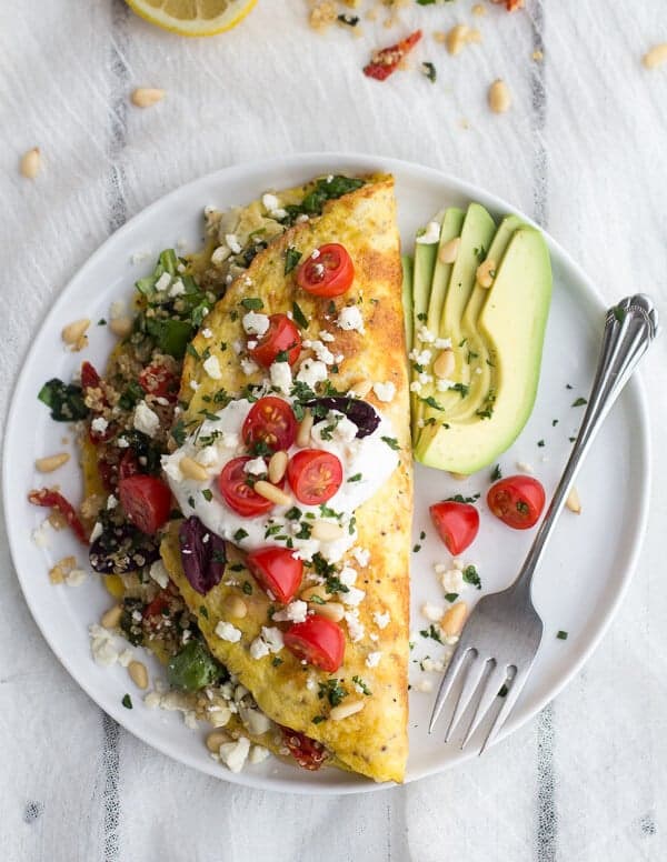 Mad Greek Quinoa Dinner Omelets with Feta and Tzatziki | halfbakedharvest.com