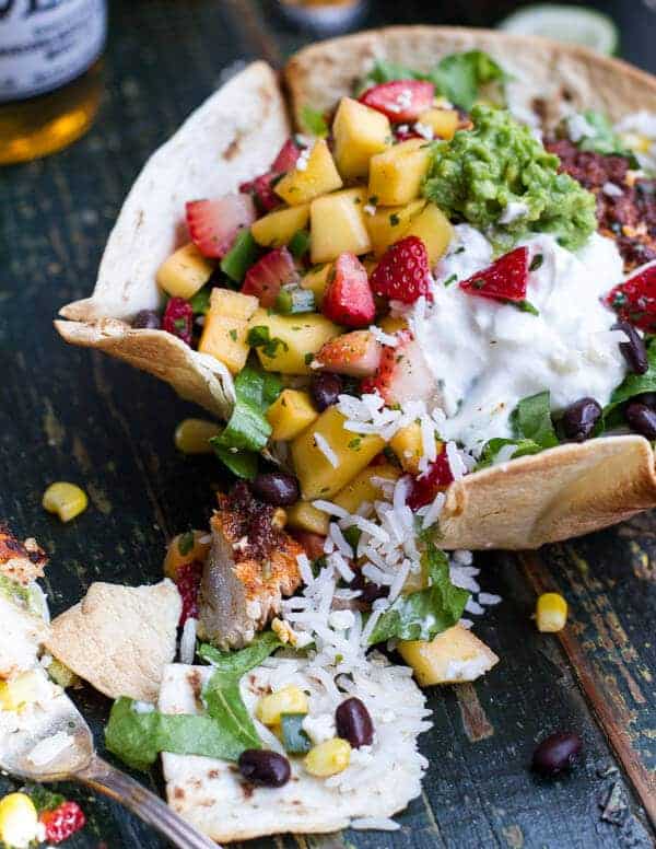 Chipotle Mahi Mahi Burrito Bowls w/ Coconut Lime Rice + Strawberry-Mango Salsa | halfbakedharvest.com