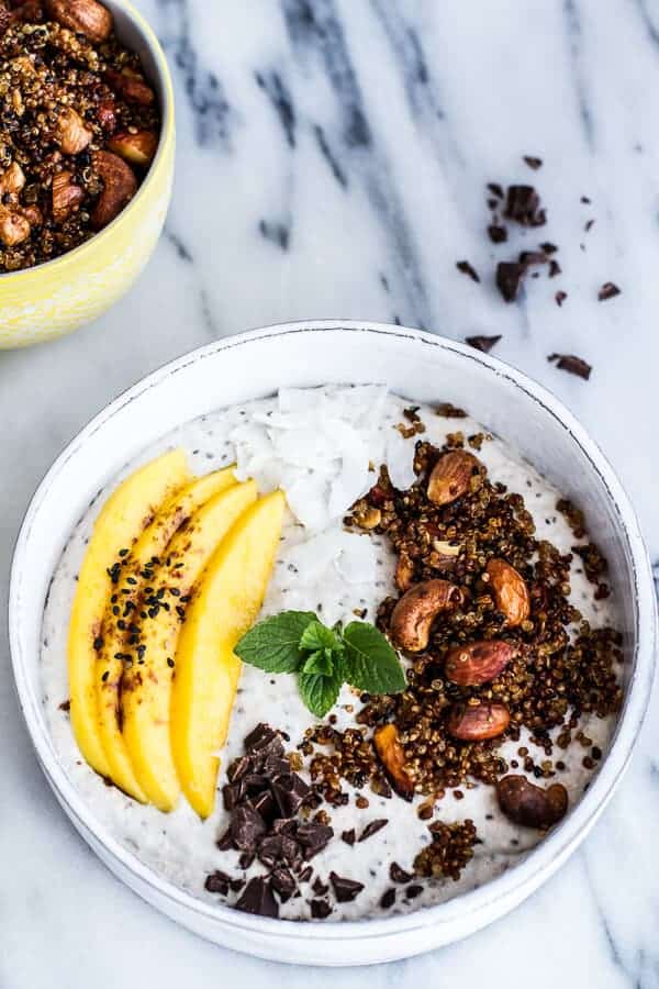 Coconut Banana Oats Smoothie Bowl with Crunchy Black Sesame Quinoa Cereal + Mango | halfbakedharvest.com