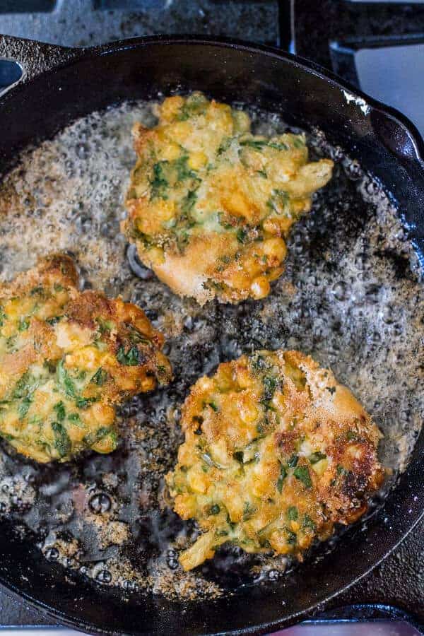Spinach and Artichoke Corn Fritters with Brie and Sweet Honey Jalapeño Cream | halfbakedharvest.com