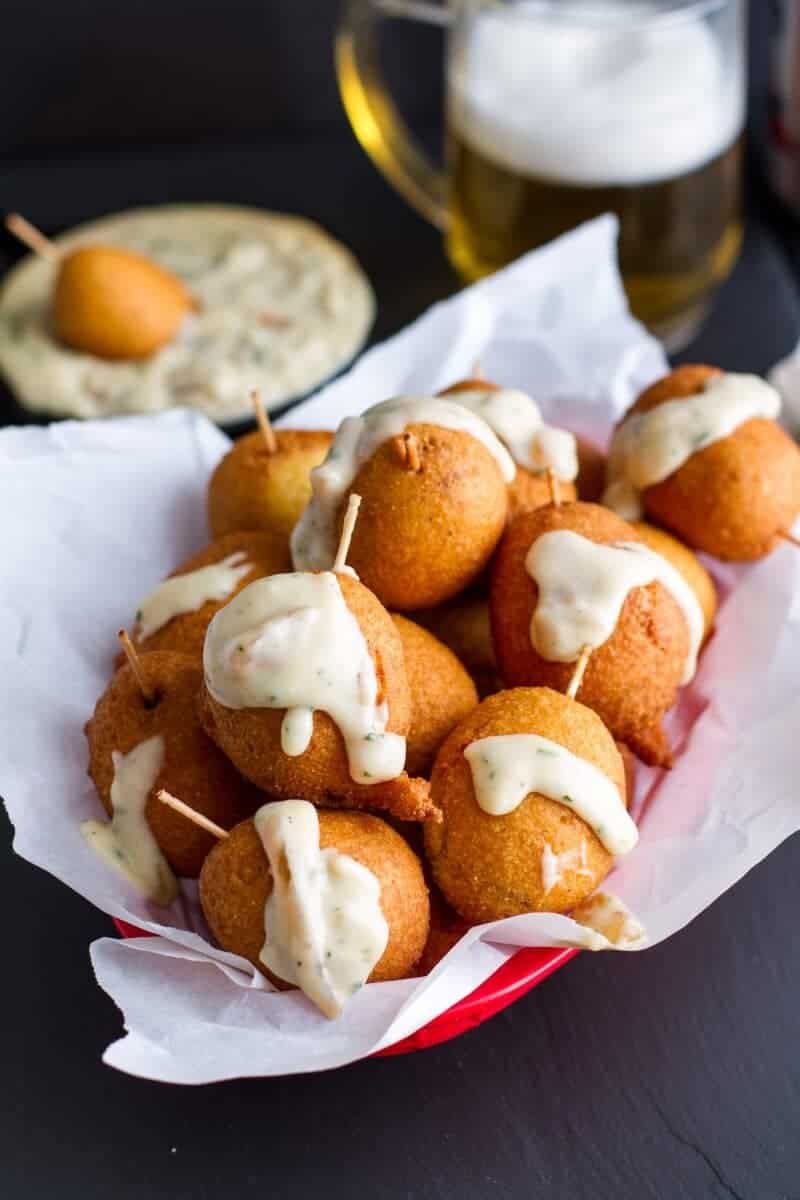 Mini Brat Corn Dogs with Caramelized Onion Cheddar Sauce | halfbakedharvest.com