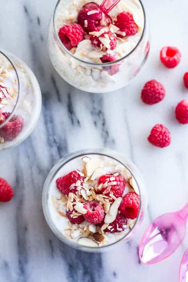 Vanilla Bean Coconut Quinoa Pudding with Honey Drizzled Raspberries | halfbakedharvest.com