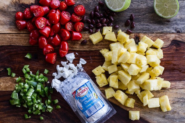 Caribbean Jerk Salmon with Curried Pineapple and Goat Cheese Salad | halfbakedharvest.com for @President Cheese #artofcheese