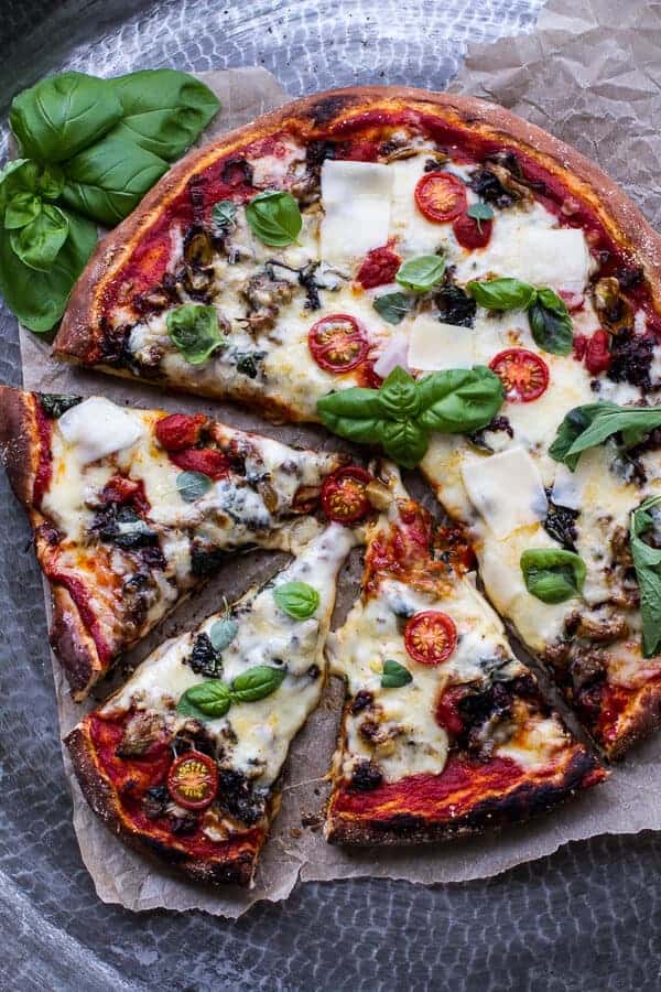 Cheesy Fontina Caramelized Onion, Chorizo, Spinach and Artichoke Pizza | halfbakedharvest.com @hbharvest