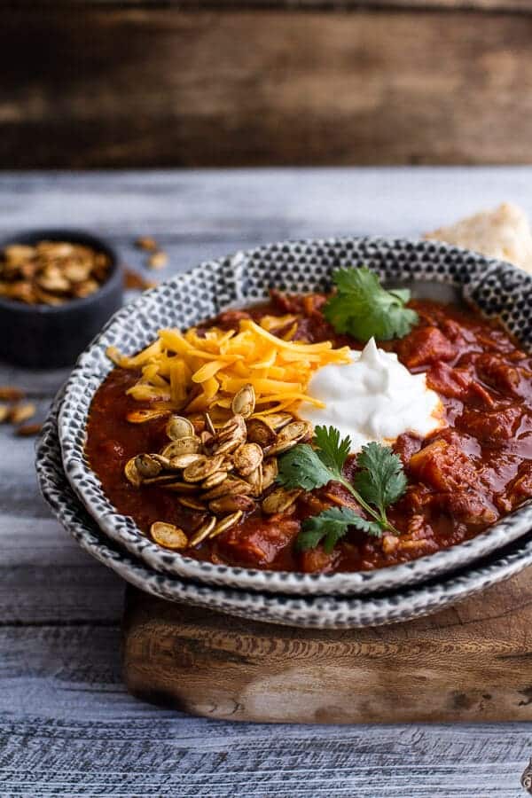 Crockpot Chipotle Pulled Pork Pumpkin Chili w/Cinnamon Roasted Pumpkin Seeds | halfbakedharvest.com @hbharvest