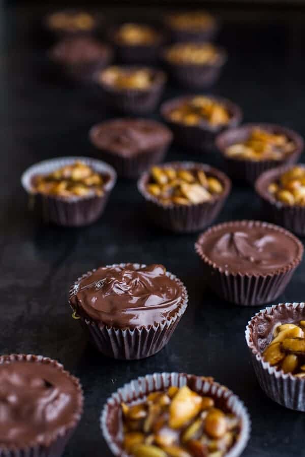 Mini Chocolate Pumpkin Seed Candy Peanut Butter Cups | halfbakedharvest.com @hbharvest
