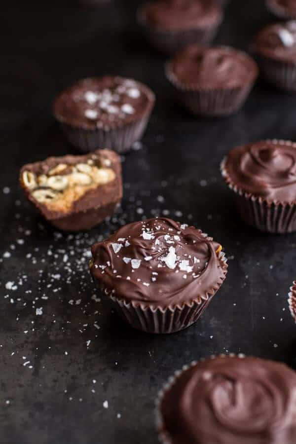 Mini Chocolate Pumpkin Seed Candy Peanut Butter Cups | halfbakedharvest.com @hbharvest