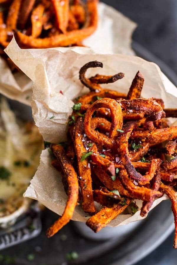 Skinny Tandoori Butter Sweet Potato Fries w/Creamy Baked Harissa Feta | halfbakedharvest.com @hbharvest