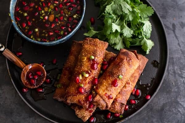 Chinese Chicken and Brussels Sprouts Egg Rolls with Sweet Chile Pomegranate Sauce | halfbakedharvest.com @hbharvest