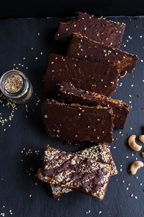 Dark Chocolate Dipped Crunchy Coconut Cashew Sesame Bars | halfbakedharvest.com @hbharvest