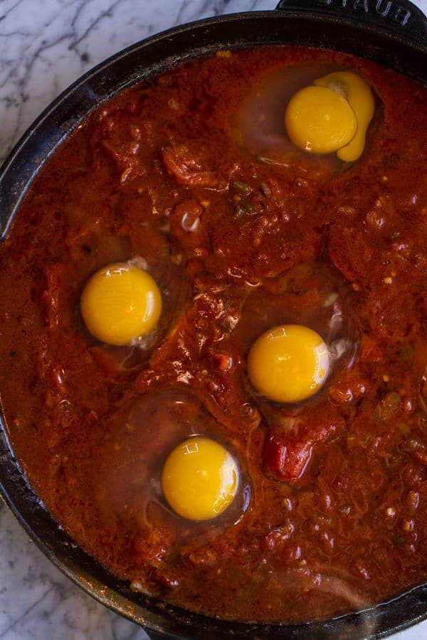 Northern Indian Style Baked Eggs with Green Harissa + Naan | halfbakedharvest.com @hbharvest