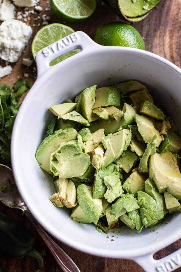Spicy Black Bean and Lentil Chili with Cotija Guacamole + Chipotle Sweet Potato Fries | halfbakedharvest.com @hbharvest