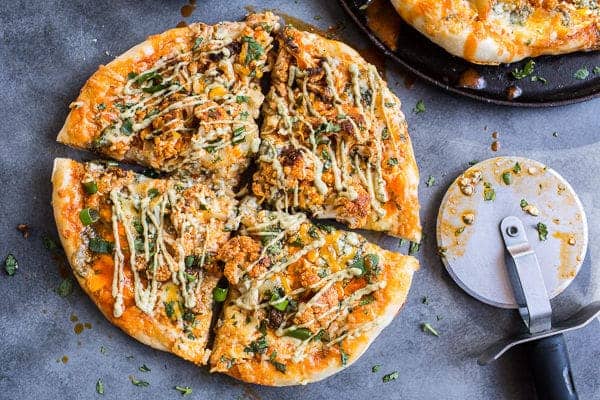 Buffalo Roasted Cauliflower Pizza with Chipotle Blue Cheese Avocado Drizzle | halfbakedharvest.com @hbharvest