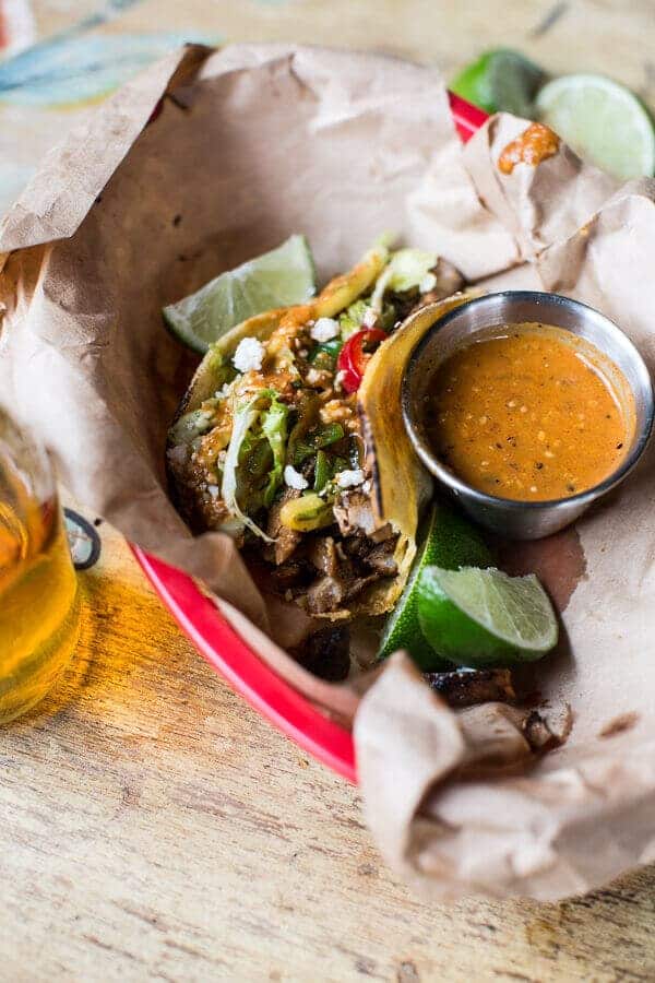 Bulgogi BBQ Pork Tacos with Charred Tomatillo Sesame Sauce + Spring Onion Slaw | halfbakedharvest.com @hbharvest