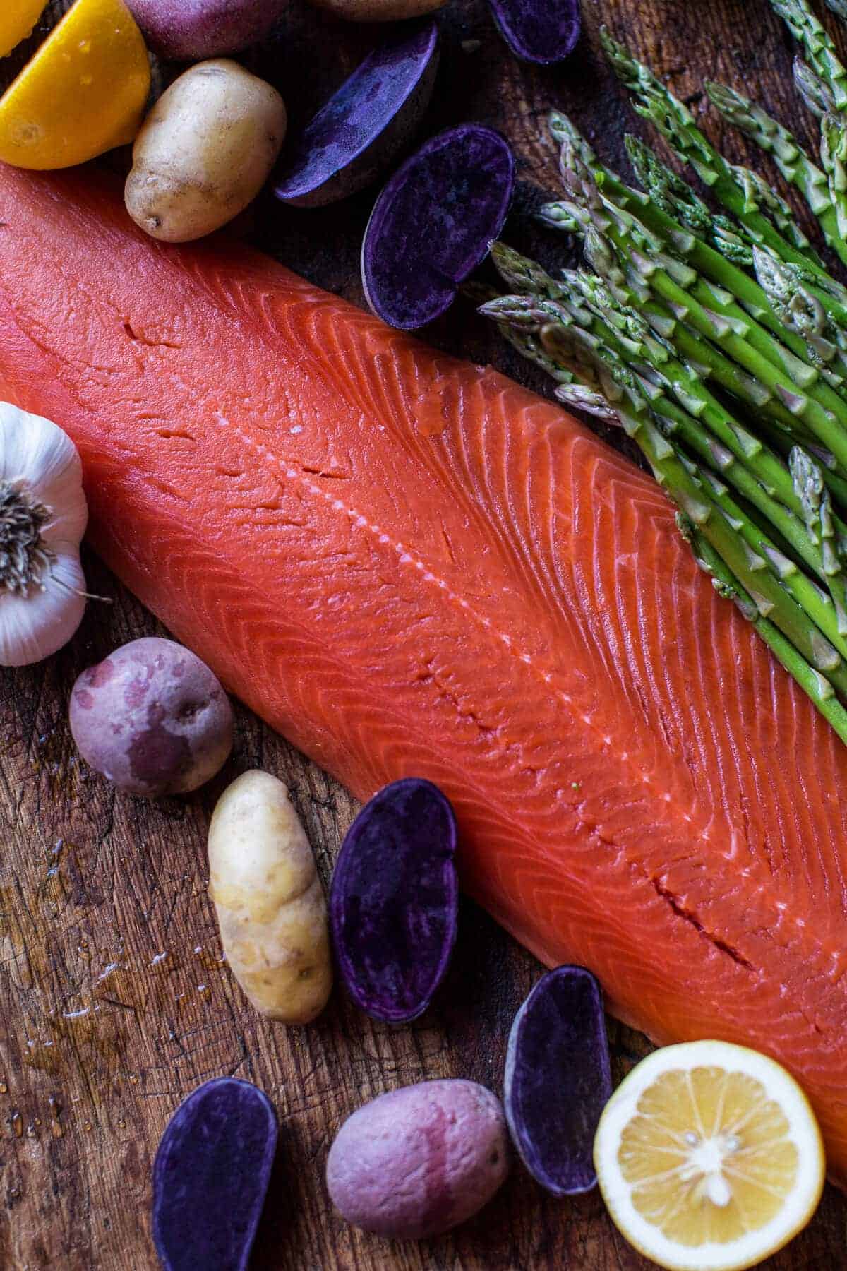One Pan Lemon Roasted Salmon, Potatoes and Parmesan Asparagus | halfbakedharvest.com @hbharvest