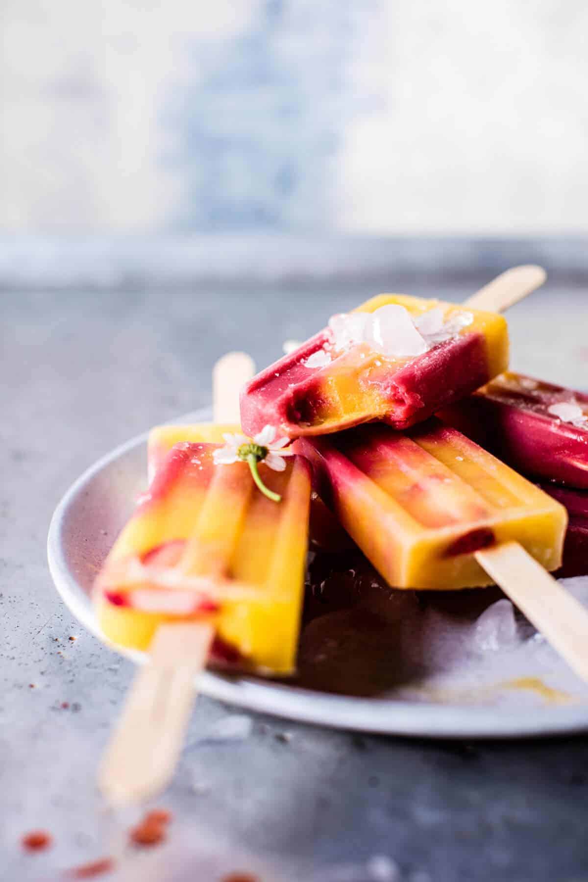Three Ingredient Strawberry Mango Popsicles | halfbakedharvest.com @hbharvest