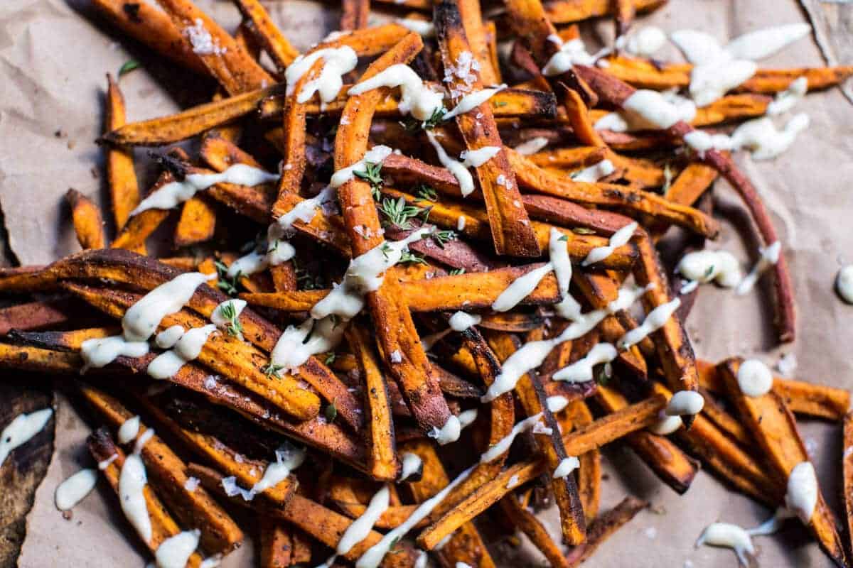 Skinny Cajun Sweet Potato Fries with Garlic Cheese Sauce | halfbakedharvest.com @hbharvest