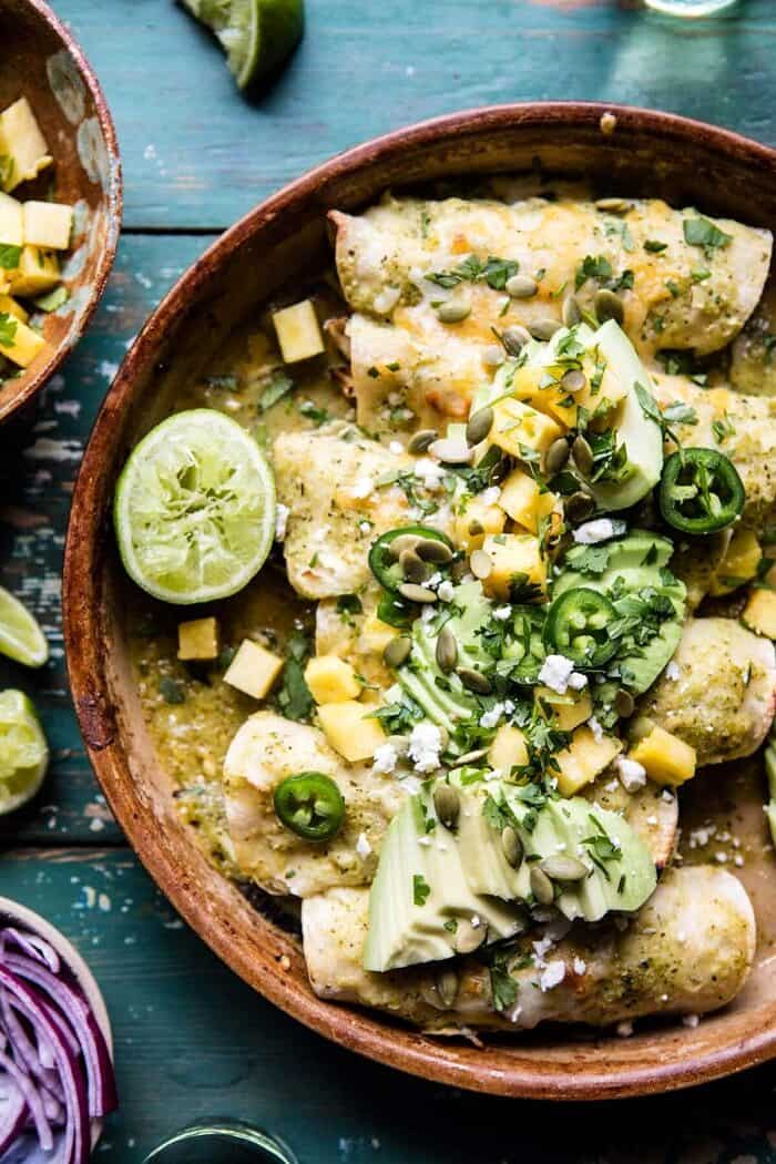 Lightened Up Salsa Verde Chicken Enchiladas with Pineapple Avocado Salsa | halfbakedharvest.com @hbharvest