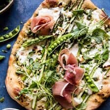 Super Green Pea and Asparagus Burrata Pizza | halfbakedharvest.com @hbharvest