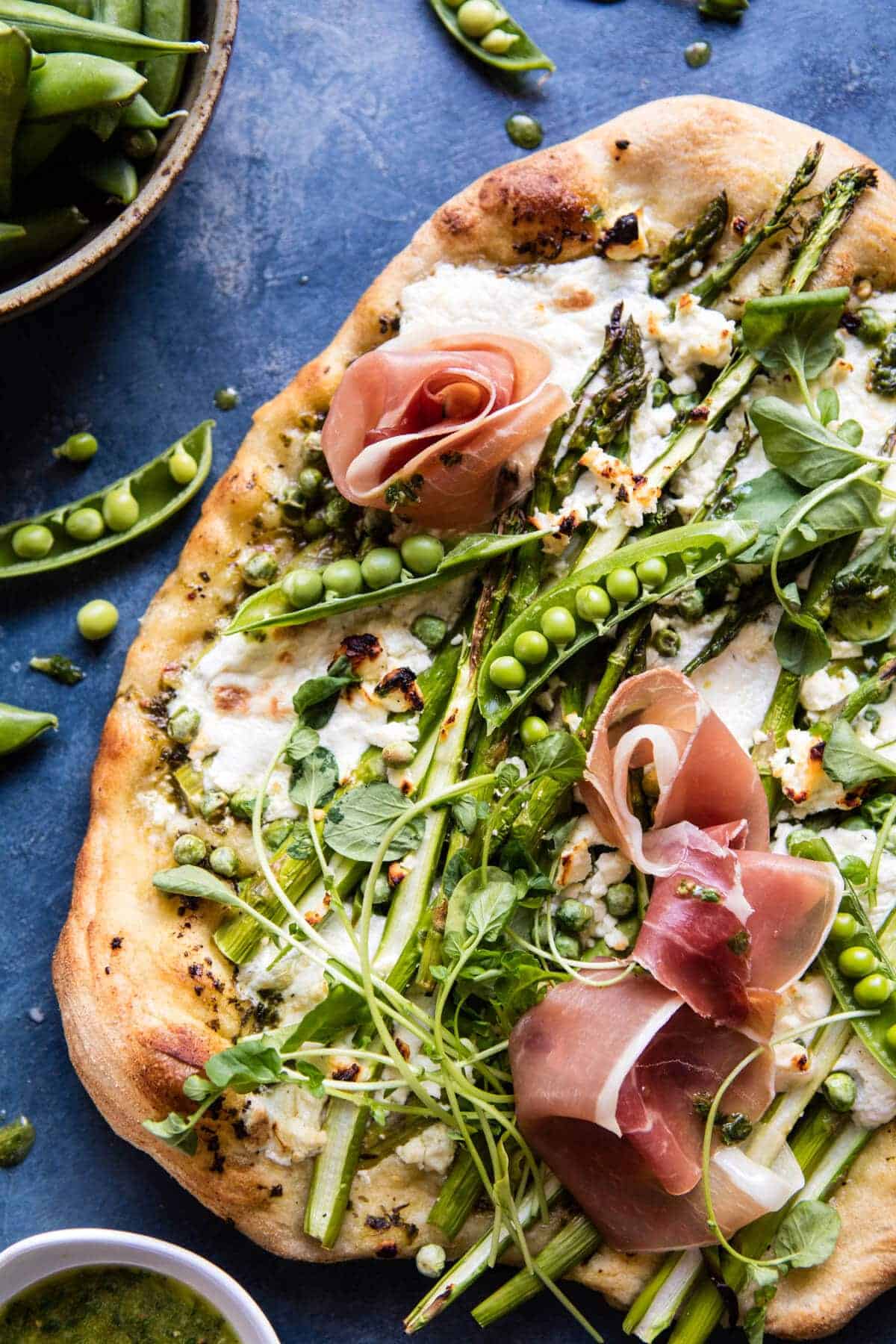 Super Green Pea and Asparagus Burrata Pizza | halfbakedharvest.com @hbharvest
