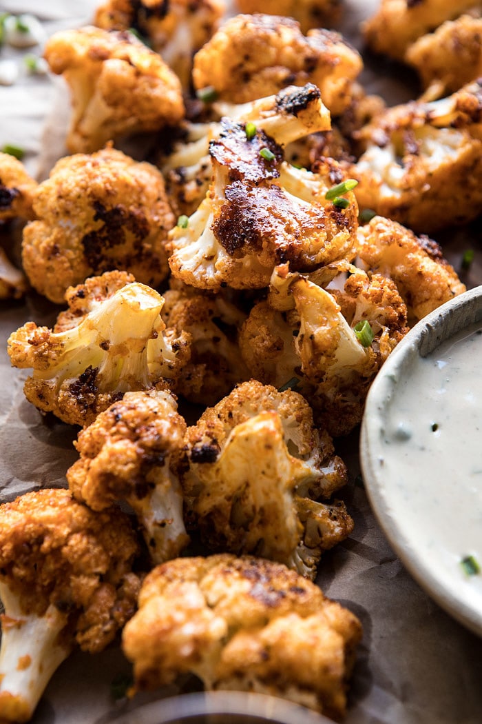 Spicy Cauliflower Cheese Bites with Tahini Ranch | halfbakedharvest.com #cauliflower #healthy #recipe
