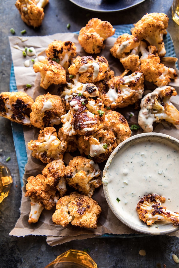 Spicy Cauliflower Cheese Bites with Tahini Ranch | halfbakedharvest.com #cauliflower #healthy #recipe