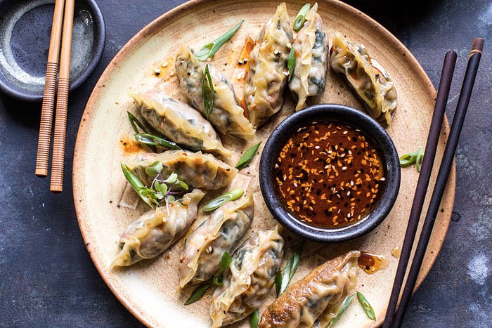 Homemade Vegetable Potstickers with Toasted Sesame Honey Soy Sauce | halfbakedharvest.com #vegan #recipes #healthy #homemade