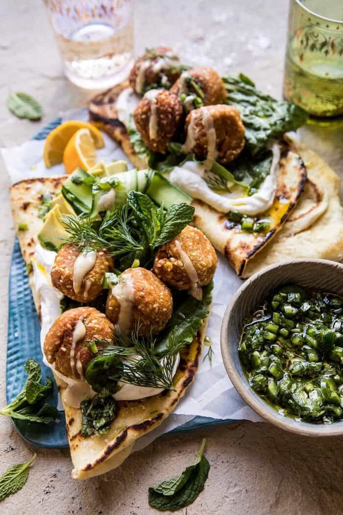 Sesame Falafel with Ginger Tahini and Jalapeño Sauce | halfbakedharvest.com #greek #healthy #recipes