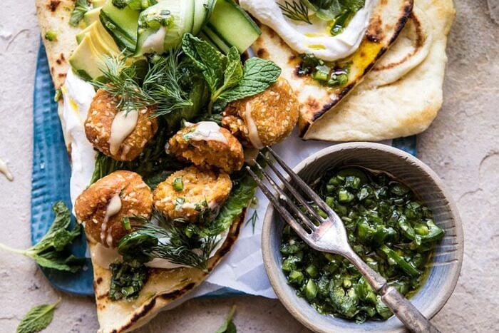 Sesame Falafel with Ginger Tahini and Jalapeño Sauce | halfbakedharvest.com #greek #healthy #recipes