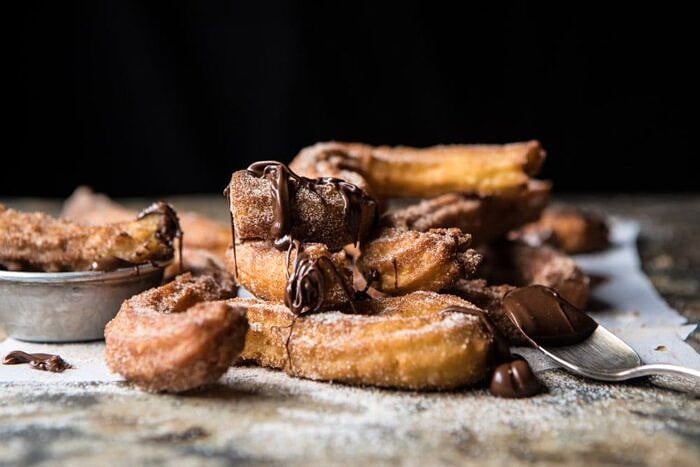 Easy Cinnamon Churros with Coffee Chocolate Sauce | halfbakedharvest.com #mexican #doughnut #dessert #chocolate