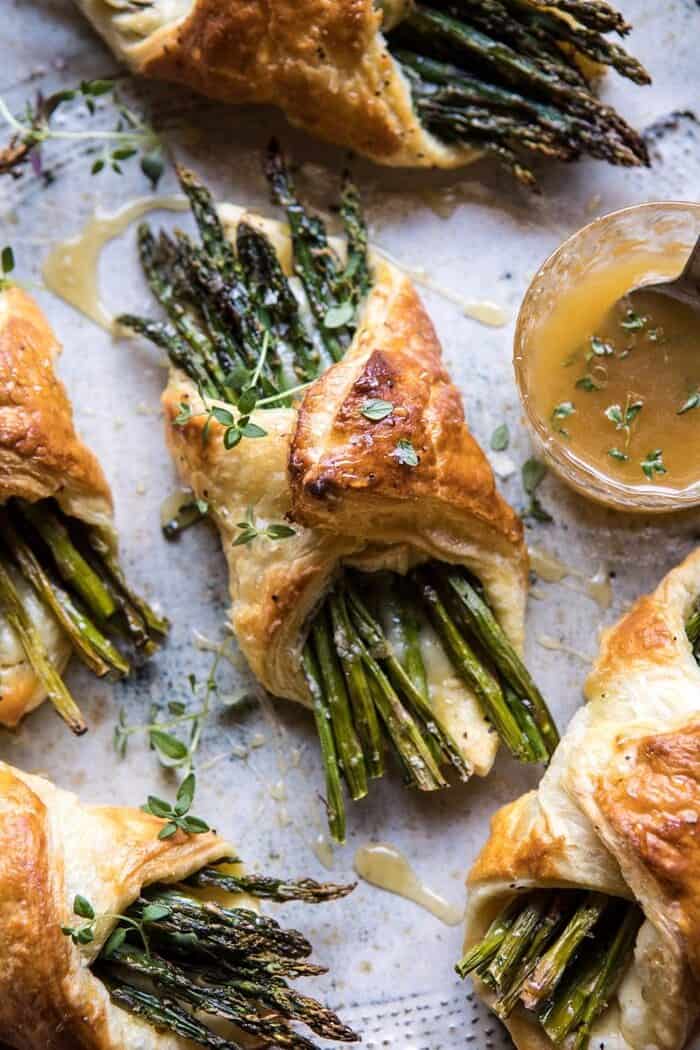overhead close up photo of Asparagus and Brie Puff Pastry with Thyme Honey