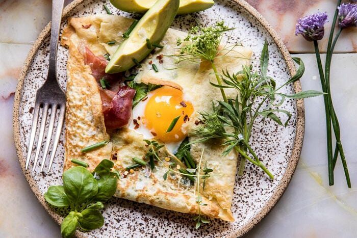 Baked Egg Crepes with Spring Herbs and Avocado | halfbakedharvest.com #breakfast #brunch #easyrecipe horizontal photo of Baked Egg Crepes with Spring Herbs and Avocado