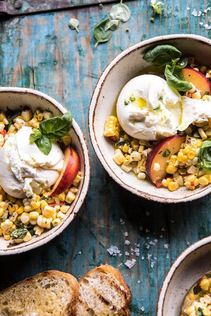 Spicy Corn and Peaches with Burrata | halfbakedharvest.com #summer #easyrecipe #salad angled photo of Spicy Corn and Peaches with Burrata