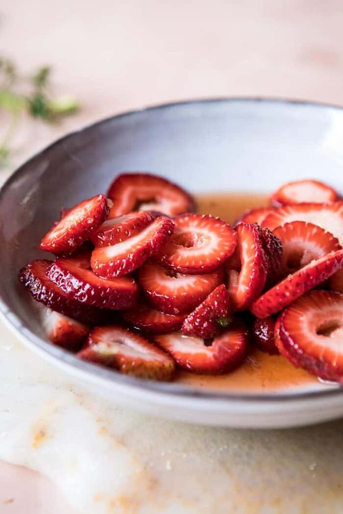Strawberry Bourbon Shortcakes | halfbakedharvest.com #strawberries #shortcake #spring #summer #easyrecipe photo of strawberries for Strawberry Bourbon Shortcakes