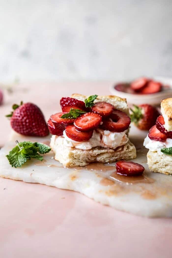 Strawberry Bourbon Shortcakes | halfbakedharvest.com #strawberries #shortcake #spring #summer #easyrecipe front on photo of Strawberry Bourbon Shortcakes