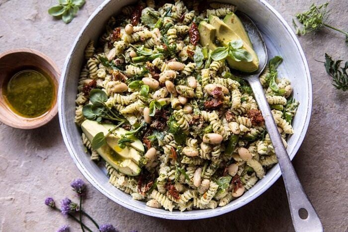 overhead horizontal photo of Sun-Dried Tomato, White Bean, and Goat Cheese Pasta Salad 