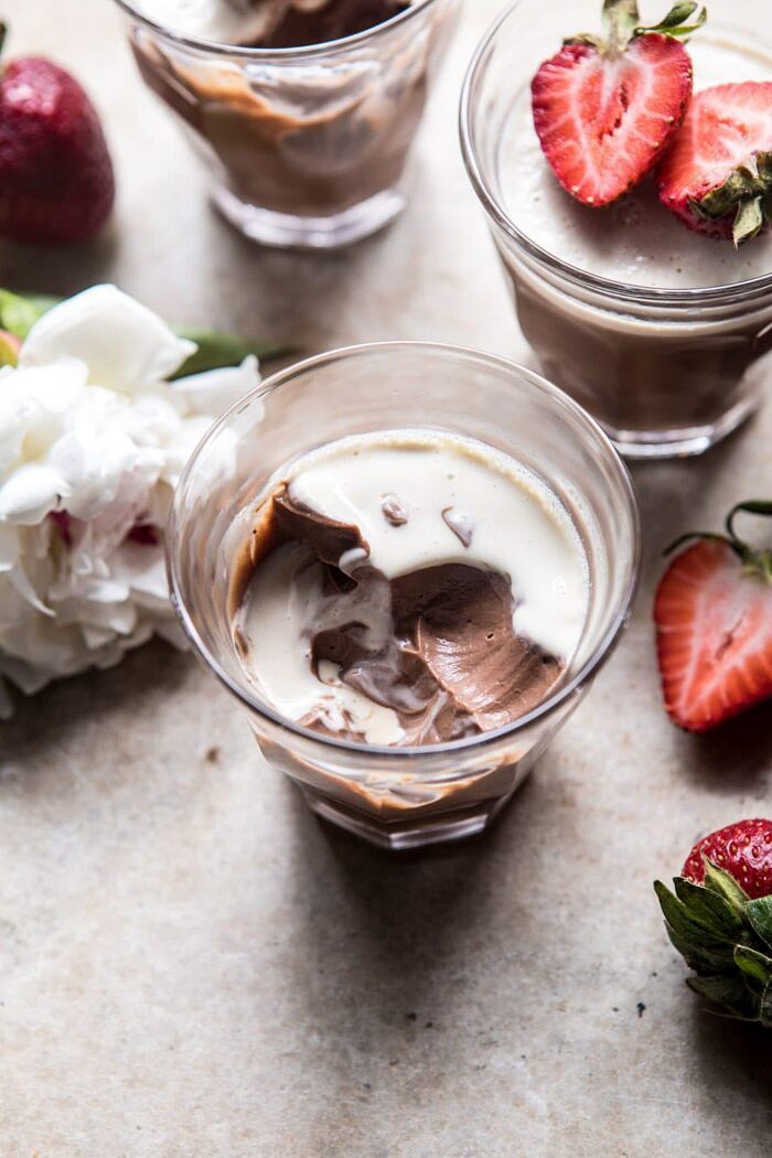 Creamy Mocha Custard | halfbakedharvest.com #chocolate #dessert #summerrecipes overhead photo of Creamy Mocha Custard with flowers and strawberries