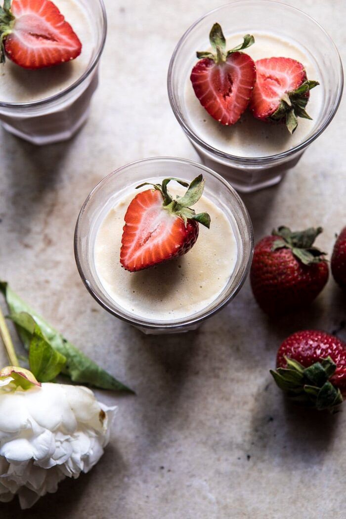 Creamy Mocha Custard | halfbakedharvest.com #chocolate #dessert #summerrecipes overhead photo of Creamy Mocha Custard with strawberries on top